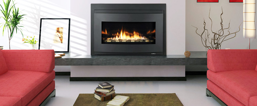 Image of a husband and wife with their children laughing.